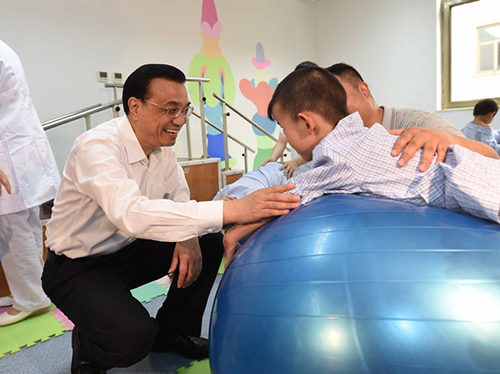 這三年，總理牽掛的殘疾人群體，迎來哪些暖政？