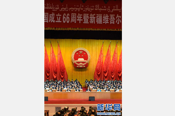 10月1日，慶祝中華人民共和國(guó)成立66周年暨新疆維吾爾自治區(qū)成立60周年大會(huì)在新疆人民會(huì)堂隆重舉行。 新華社記者 高潔 攝 