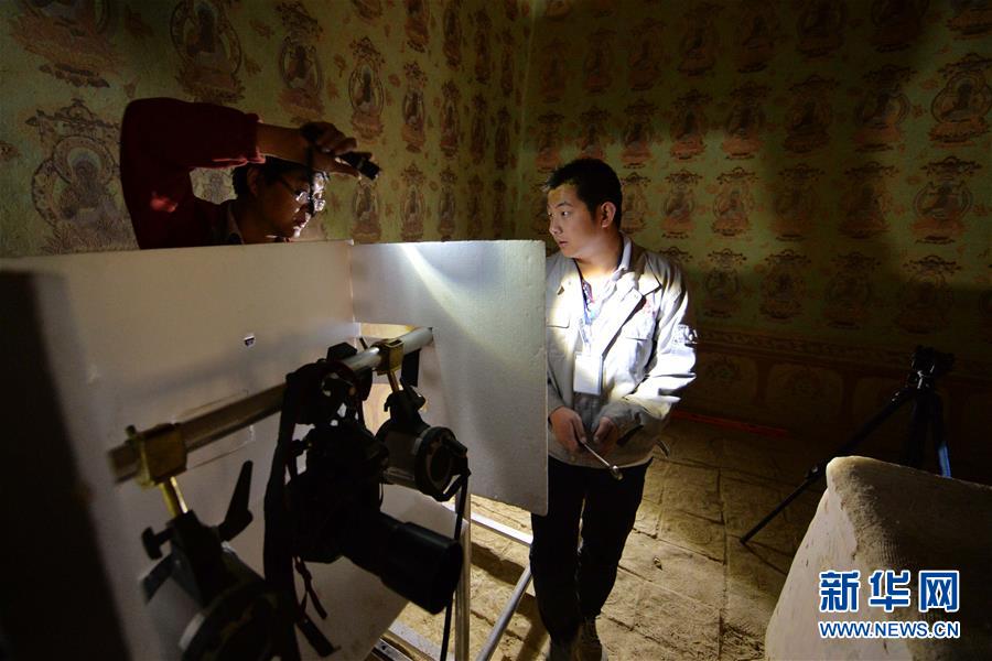 （時(shí)代先鋒&middot;圖文互動(dòng)）（16）此生不悔入沙海 勇?lián)厝问家娊?mdash;&mdash;敦煌研究院文物保護(hù)利用群體群像