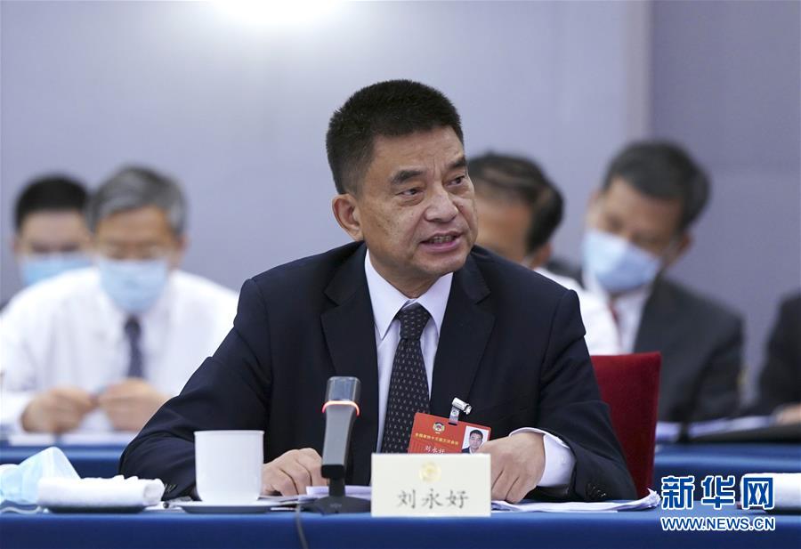 （兩會&middot;熱點畫報）（3）代表委員建言統(tǒng)籌做好經(jīng)濟(jì)社會發(fā)展工作