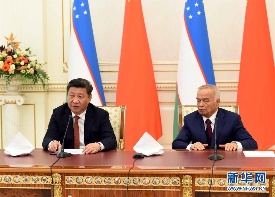 6月22日，國家主席習(xí)近平在塔什干庫克薩萊國賓館同烏茲別克斯坦總統(tǒng)卡里莫夫舉行會談。會談后，兩國元首共同會見記者。 新華社記者饒愛民攝