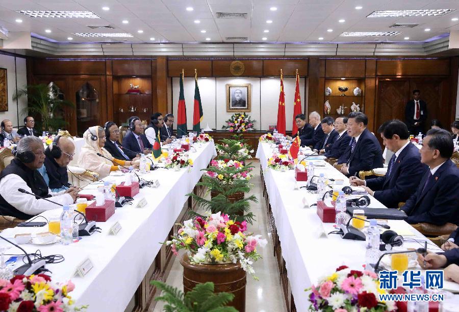 10月14日，國家主席習(xí)近平在達卡同孟加拉國總理哈西娜舉行會談。 新華社記者劉衛(wèi)兵攝 